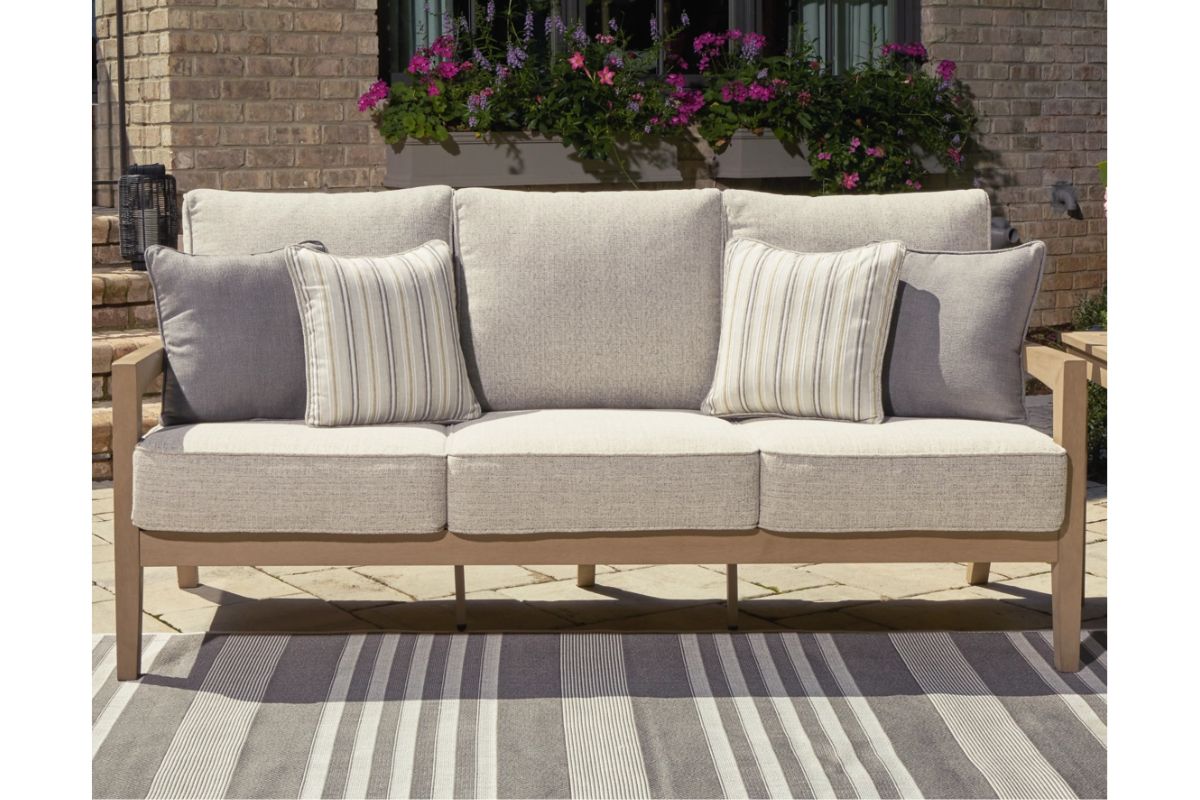 012468937:Hallow Creek Patio Sofa, Styled